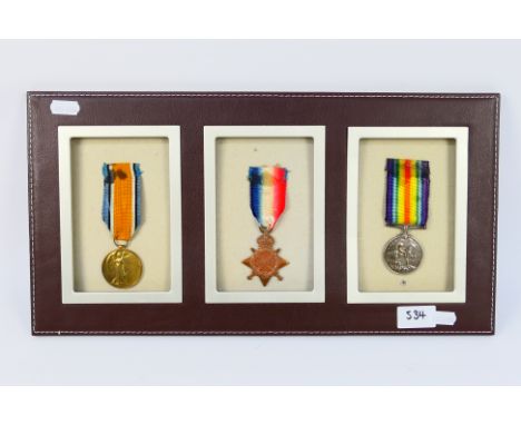 A display of three World War One (WW1 / WWI) medals comprising 1914 - 1915 Star, Victory Medal and War Medal, named to 103635