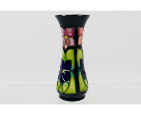 Moorcroft - A small Moorcroft Pottery vase, decorated in the Violet pattern, designed by Sally Tuffin, 1994, impressed marks 