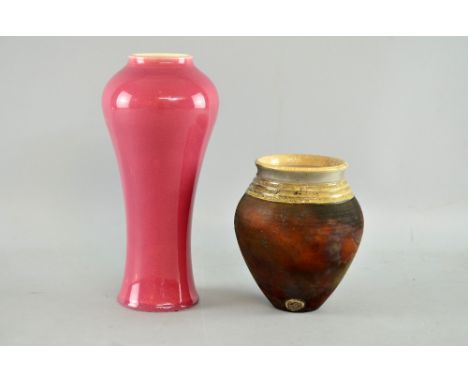 Ault pottery pink glazed vase of inverted baluster form, impressed Ault, England 22cm, and a Flaxman pottery Raku jar by Elea