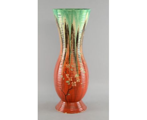 Clarice Cliff  Delicia pattern vase  of baluster form with flared rim and ribbed body, hand painted on glaze predominately in