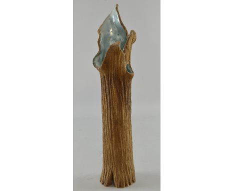 A studio pottery vase by Clive Brooker in the form of a tree trunk. Applied seal mark inside, 40cm high