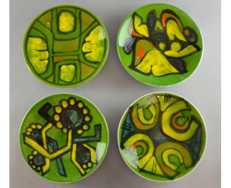 Four Poole pottery Delphis design plates each 26cm, various designers,