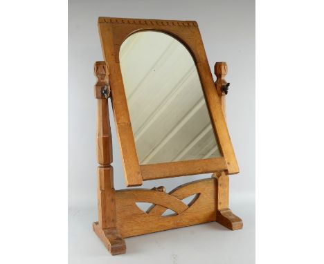 Robert 'Mouseman' Thompson an unusual toilet mirror with castellated carved frieze and  Celtic motif, a graduating octagonal 
