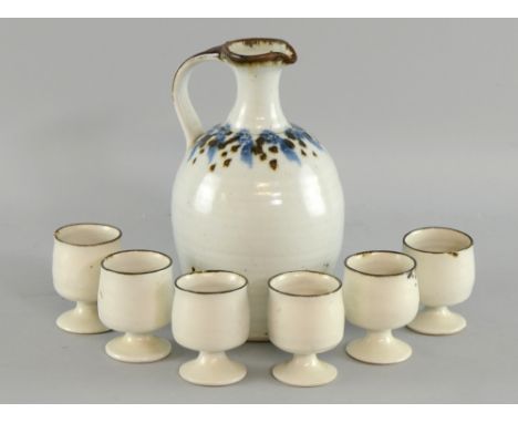 John Maltby sake jug and cups  with painted decoration on cream glaze