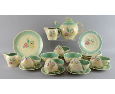 Susie Cooper Kestrel form part tea service in Nosegay pattern:Teapot, two Cream jugs , two sugar bowls, ten cups, eleven sauc