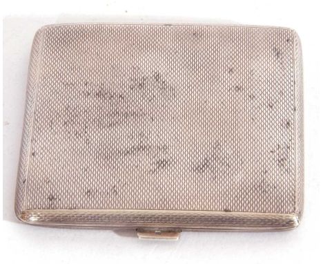 Cased silver ladies compact square form with engine turned decoration, push in clasp opening to a mirrored lid and powder res