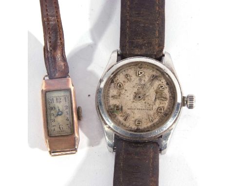 A vintage Gents Tudor wrist watch along with a 9ct gold ladies cocktail watch. The Tudor has a stainless steel case with a sc