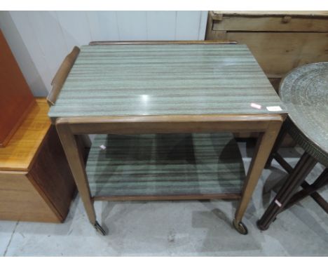 A vintage extending tea trolley