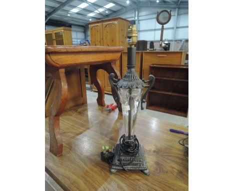 A reproduction table lamp