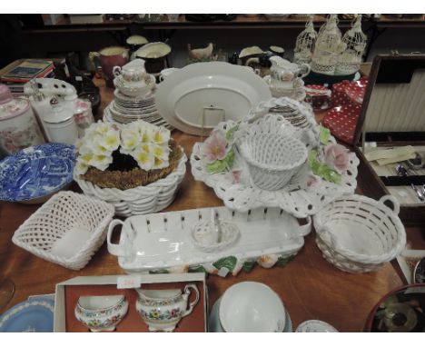 A selection of white glaze ceramic pierced fruit and similar bowls