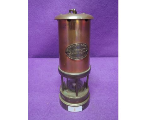 A miners lamp by Hockley colliery with brass fitments and copper body