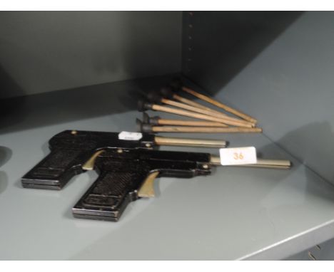 Two childrens toy dart guns by Chad Valley