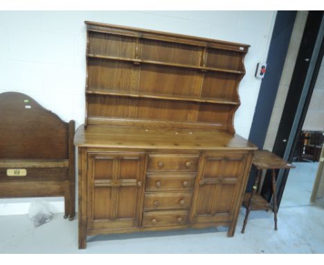A mid colour Ercol dresser