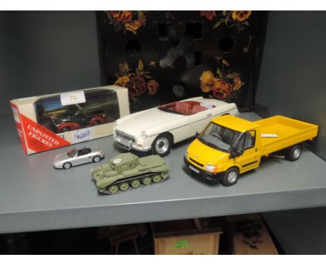 A selection of die cast model cars including Transit pick up