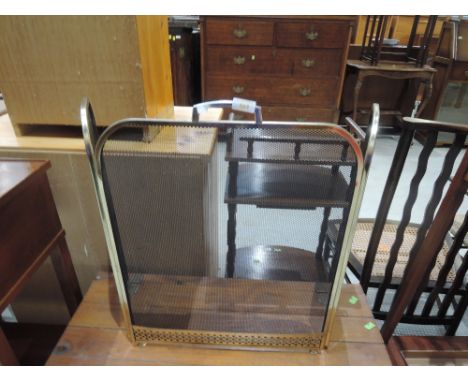 A modern trifold fireguard