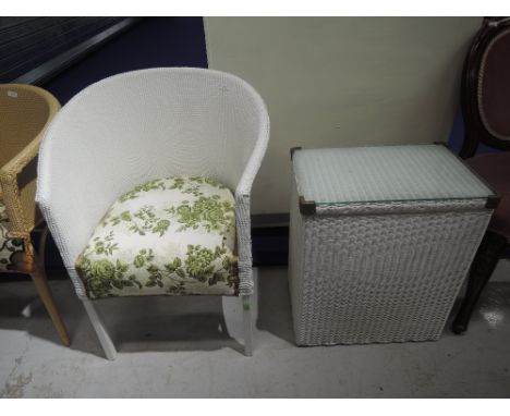 A Lloyd loom linen box and woven fibre tub chair