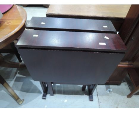 Two vintage dark stained sutherland tables