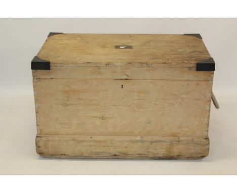 Early 20th century pine and brass bound trunk with end rope handles, 102cm wide x 60cm deep x 63cm high