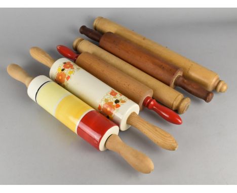 A Collection of Vintage Rolling Pins to Include Two Ceramic Examples 