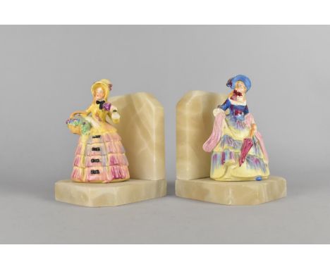 A Pair of Mid 20th Century Onyx Bookends with Crinoline Lady Ceramic Figures, 14cms High 