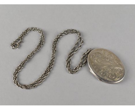 A Large Silver Locket on Silver Chain, the Locket Hallmarked for London 1972, Locket 5cmx4cm Chain 60cm 