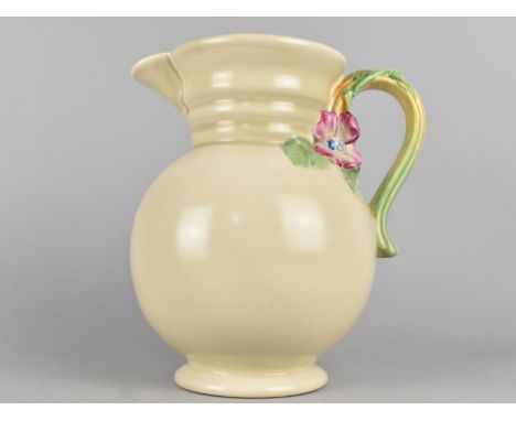 A Clarice Cliff Newport Pottery Jug, Shape No. 595, With Peony Flower and Stem Handle, 22cm high 