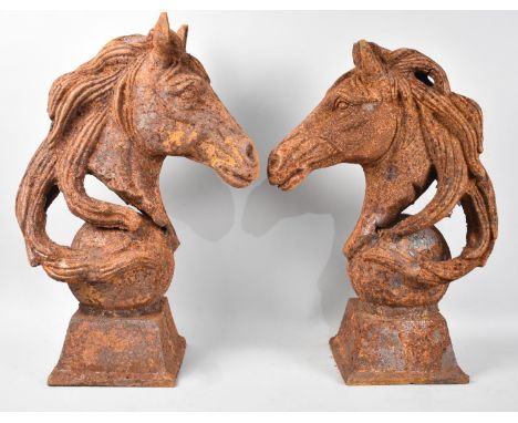 A Pair of Large Heavy Cast Iron Gate Post or Wall Finials in the Form of Horses Head, Somewhat Rusted, 46.5cms High 