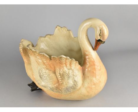 A Large Glazed Pottery Planter in the Form of a Swan, 32cms Long 