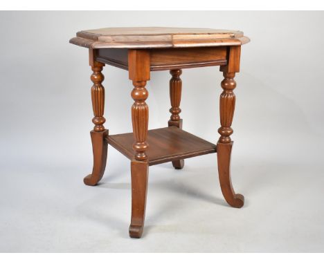 An Edwardian Mahogany Octagonal Table with Stretcher Shelf, 60cms Wide 