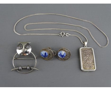 A SILVER INGOT &amp; FINE CHAIN marked 'Suisse Half Ounce Fine Silver 999.0', 20 grms, a sterling silver owl brooch, 6.5 grms