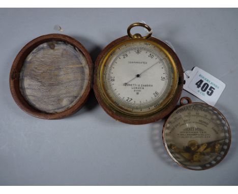 A GILT DRUM CASED COMPENSATED BAROMETER by Negretti &amp; Zambra, London, no. 21061 in original fitted case along with a pock