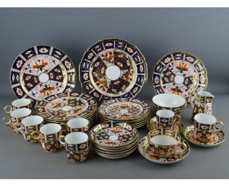 THIRTY SIX PIECES OF ROYAL CROWN DERBY 2451 PATTERN IMARI TEAWARE comprising six cups with 10.5 cms diameter saucers, six 10.