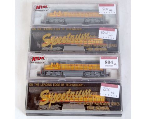 Two Atlas N gauge Union Pacific GP40 diesels, No. 910 and No. 912 (NM,BNM) and two Bachmann Spectrum, SD series diesels, UP r