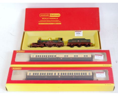A gloss green Hornby R354 GWR 4-2-2 'Lord of the Isles' engine and tender with instructions (NM-BNM) and sold with R4229D and