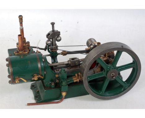 A Stuart Turner No. 9 horizontal mill engine length 11 ins with 1½ inch stroke and 1½ bore, with feed pump and governor, vend
