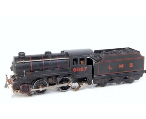 A Trix Twin Railway prewar freelance 0-4-0 engine and tender LMS black No. 8067, good for age (G)