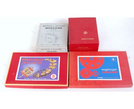 Four French Meccano post-war items: 20v electric motor, unused (E) (BVG-E); No.1A clockwork motor (G) (BG); two Gears B outfi
