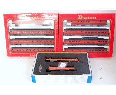 A Bachmann USA H0 Southern Pacific Daylight Express 4-6-4 No. 4449 (VG,BVG) with 2 Rivarossi SP 1930s coach packs each of 4 c