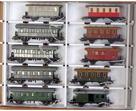 A box containing 10 Marklin 4-wheel passenger coaches, in various German liveries unboxed (G-NM)