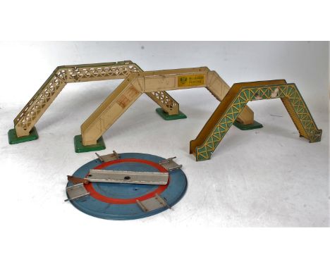 A Large tray of Hornby accessories including CAI acute angle crossing (P-BP), 2x No. 1 footbridges (F), No. 1 level crossing 