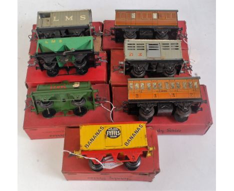 7x boxed Hornby rolling stock including 1935-9 NE  cattle truck (F-BF) 1933-9 Fyffes banana van, one coupling broken (F-BF), 