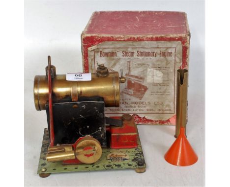 A Bowman Models of Dereham stationary steam engine comprising of tin housed brass boiler, powering a single oscillating cylin