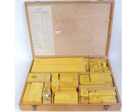 Post-war Dealers “Small Selection” wooden storage cabinet FULL of Meccano parts in original yellow boxes, few, if any are fac