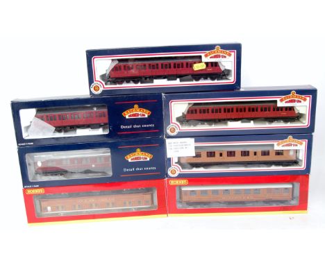Five Bachmann and two Hornby coaches, 3 Bachmann BR Mk1 suburban crimson, Thompson BR maroon First corridor, Thompson LNER br