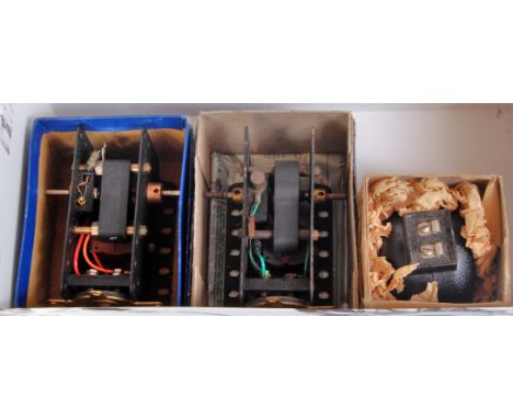 Three Meccano electric motors: early post-war EO20, non-reversing, tag terminals, appears unused (E) (BVG); E20R(S) used (G) 