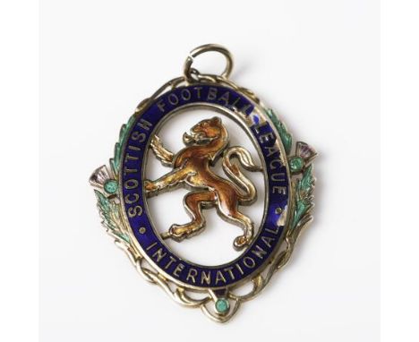 GEORGE CONNELLY OF GLASGOW CELTIC F.C. MEDAL
a Scottish Football League International gold and enamelled medal, inscribed ver