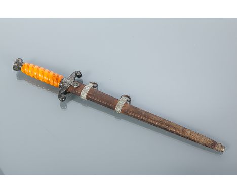 THIRD REICH LUFTWAFFE DAGGER
with eagle and swastika decorated cross guard, orange wire strap grip and oak-leaf pommel; toget