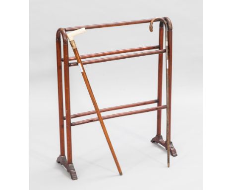 VICTORIAN MAHOGANY TOWEL AIRER
with twin end supports, 70cm wide; together with a Victorian malacca cane with ivory handle an