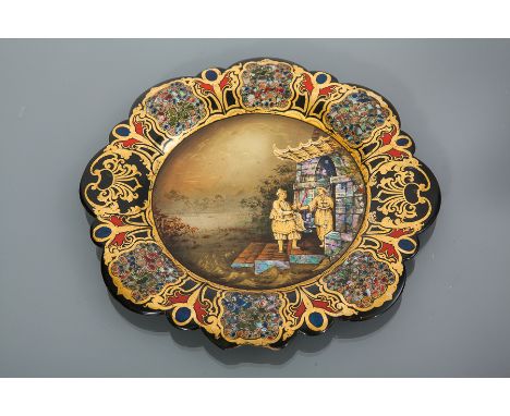 19TH CENTURY PAPIER MACHE CIRCULAR PLAQUE BY JENNENS AND BETTRIDGE
painted with a Chinoiserie scene of two figures by a pavil