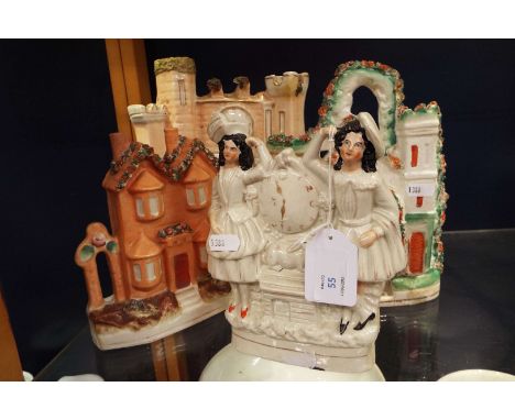 Four Staffordshire and style flat-backs; one depicting two figures with a clock and three in architectural form